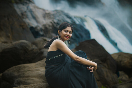 Cinematic Portrait of Indian Girl in Black Saree at Athirappilly Falls