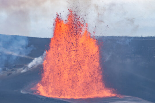 Episode 46 of lava fountaining in Halemaʻumaʻu Crater at the summit of Kīlauea ( shield volcano ). lava fountain and lava flow . Keanakako'i Overlook, Hawaiʻi Volcanoes National Park. 