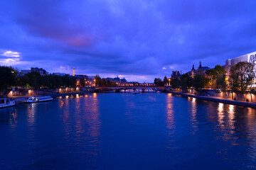Fototapeta premium river Seine waters at blue night, Paris, France