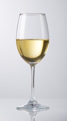 Fototapeta premium Elegant white wine glass with clear liquid and reflections