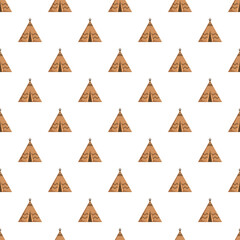Teepee seamless pattern repeating wigwam and tribal symbols on white background © nsit0108