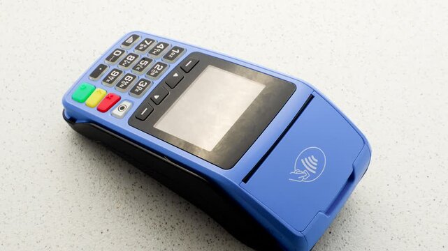 lue card machine with smooth surface, standing out with elegance and modernity. On a smooth surface, the blue card machine stands out, promoting practicality and style.