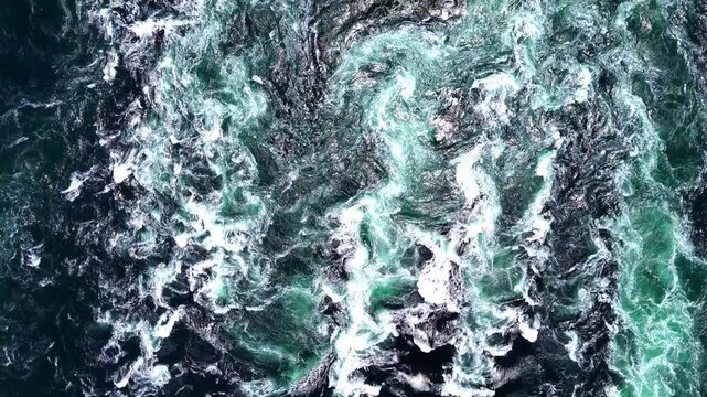 Boat Navigating Giant Whirlpools | Top Down - 4K Aerial Video
