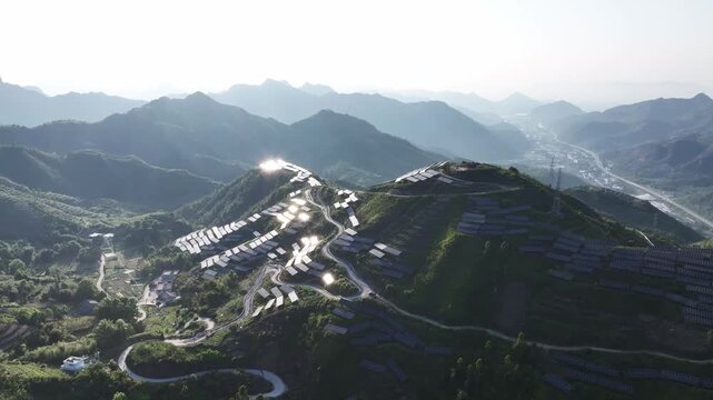 Cloudy mountain tea plantation and terraced fields with lush green vegetation
