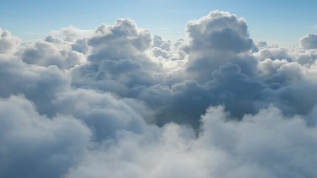 Aerial view of dense white cumulus clouds under a clear blue sky, representing serenity, height, freedom, atmosphere, meteorology, peace, and vastness