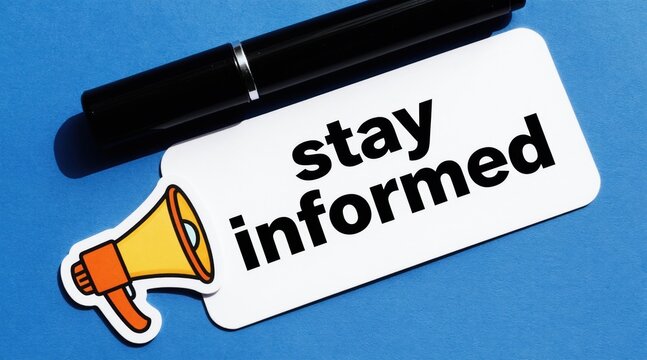 Megaphone and pen on blue background next to card with text stay informed. Message communication concept about news and updates. Knowledge and learning theme.