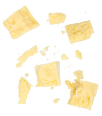 Crumbled parmesan cheese chunks and crumbs isolated background. Top view flat lay food texture for...