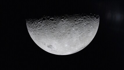 Surface of the Earth's moon in space. Satellite point of view. Cut out on black. NASA Public Domain Imagery © Marcin Janiec