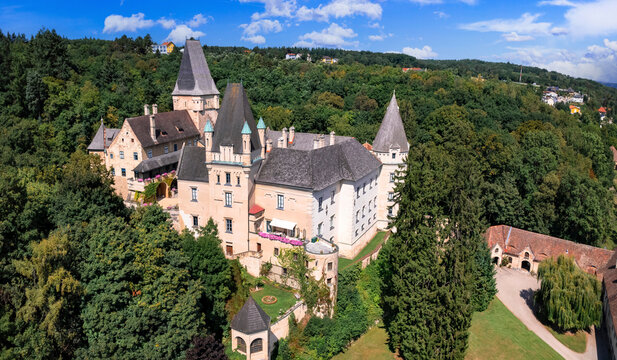 Ottenstein Castle Austria aerial drone view photo of medieval Schloss on rock. Lower Austria historic fortress in green lush trees Waldviertel region Kamp valley for world print wall art decor