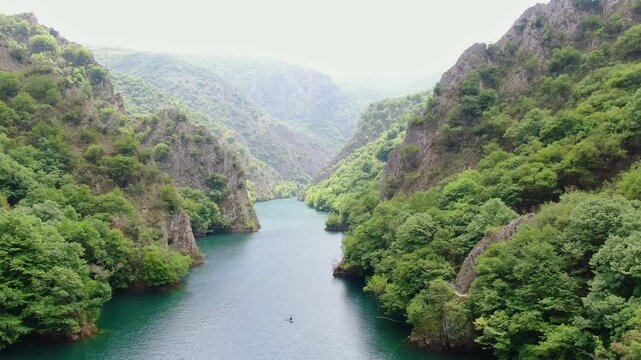 Aerial View of Canyon Matka: Nature's Reserve near Skopje, North Macedonia. Top View on River Between Mountains. Drone Video