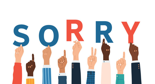 Group of diverse hands raised up holding the letters of the word sorry to express apology and reconciliation concepts.