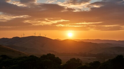 Obraz premium A breathtaking panoramic view of rolling hills bathed in the warm golden light of sunrise or sunset showcasing dramatic cloud formations