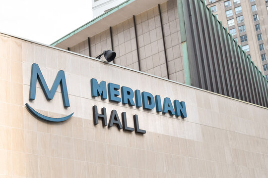 Meridian Hall signage displayed on a building exterior in downtown Toronto, showing recognizable theatre and entertainment venue branding in an urban setting in May 2026