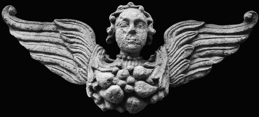 Fototapeta premium Ancient winged stone ornament isolated on black background
