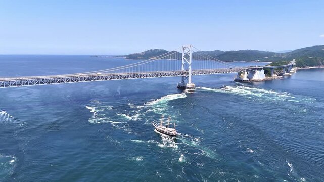 Great Naruto Bridge | Sailing Ship | Copy Space | Sky - 4K Aerial Video
