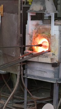 Murano Glass Master Shaping Molten Glass Inside Venetian Glass Factory