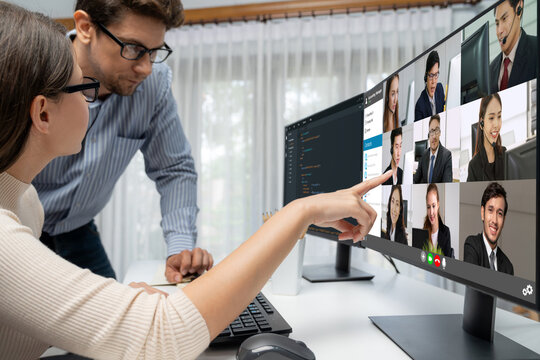 Business people on video conference for brisk virtual group meeting of corprate business office workers