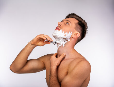 Man Shaving Neck Beard.