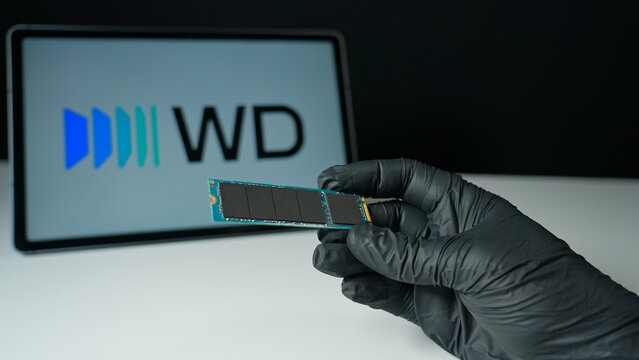 Western Digital background, display of the internal SSD Solid Stat Drive for computers and cloud data storage. WD world's largest manufacturers of HDD and SSD: Toronto, Ontario, Canada - May 9, 2026