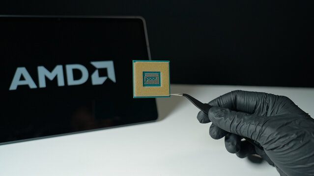 Advanced Micro Devices AMD background display, American semiconductor company, designs high-performance CPUs, GPUs, FPGAs, and adaptive computing solutions : Toronto, Ontario, Canada - May 9, 2026
