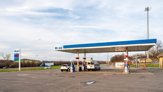 Brutus, NY - Apr 14, 2026: Exterior of the Mobil fuel station providing gasoline, diesel, and traveler refueling services located at the Port Byron Service Area