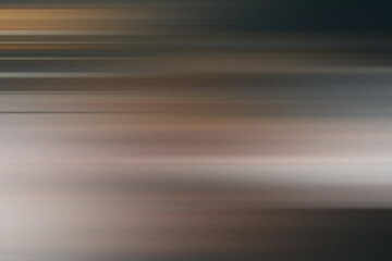 Obraz premium Abstract motion blur background with horizontal streaks of light