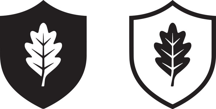 Shield with oak leaf icons in solid black silhouette and outline style representing forest conservation environmental protection and eco safety concept