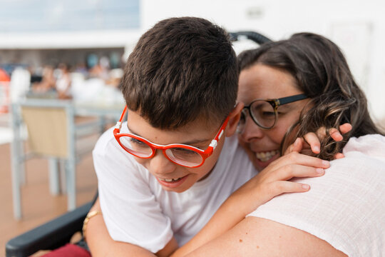 Mother and son enjoying cruise ship holidays