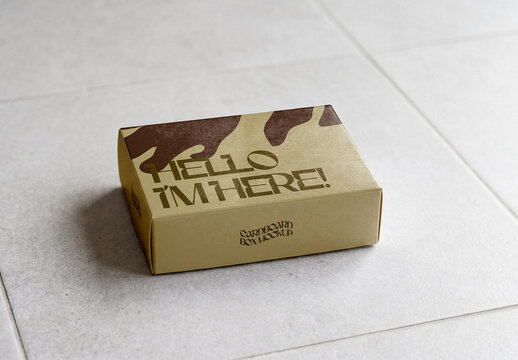 Small Cardboard Box Packaging Mockup on Tile Floor