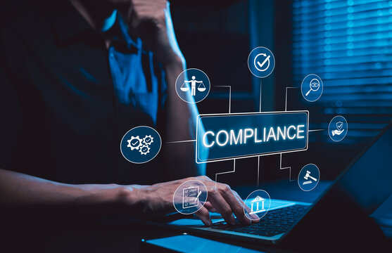 Compliance management and regulatory risk control concept. Professional using laptop with compliance icons, legal scale, checklist, audit, governance, approval, monitoring, policy verification, law,