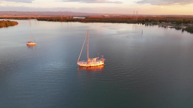 Garden Island and Torrens Island, North Adelaide, South Australia &ndash; 4K Aerial Drone Footage of Mangrove Wetlands, Kayaking Trails, Port River Estuary, Ships Graveyard, high-voltage lines at Sunset