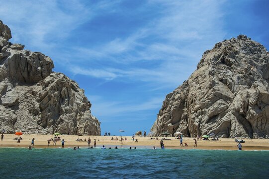 Tourists at Sandy beach, Lands End, Los Cabos, Baja California, Mexico