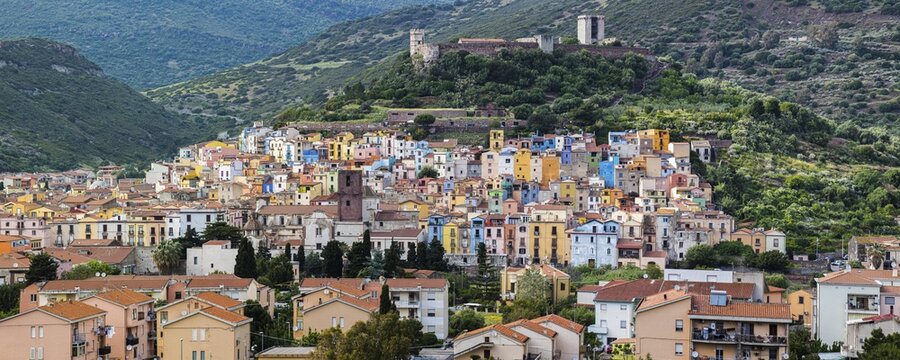 Colourful houses in the town of Bosa, above the Castello Malaspina, panoramic view, Sardinia, Italy