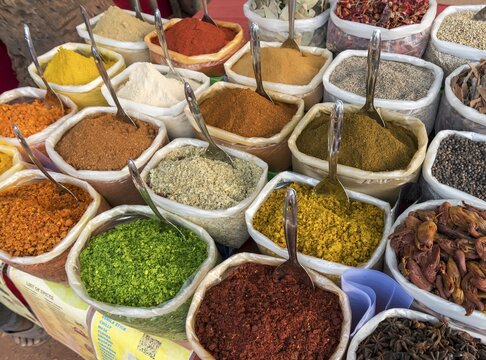 Sacks of spices, herbs and curry powders on display at Anjuna Beach Flea Market, Goa, India