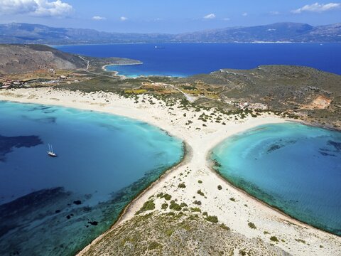 Drone shot, double bay of Simos beach, Sarakiniko beach, Elafonisos, Deer Island, Laconia, Peloponnese, Ionian Islands, Ionian Sea, Greece