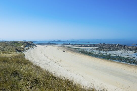 Overlook over a sand beach at the north coast of Herm, Guernsey, Channel Islands, United Kingdom