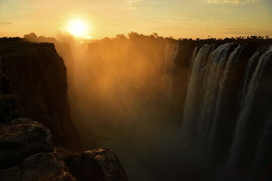 Victoria Falls in the haze, at sunset Zimbabwe, Africa