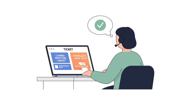 Customer service representative with headset working on laptop, successful ticket resolution