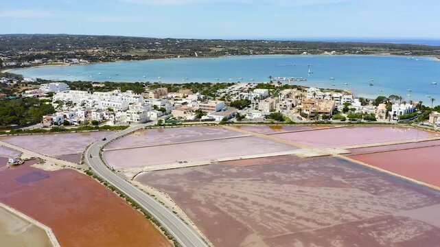 Aerial view of Estany des Peix lagoon and La Savina coastline in Formentera island, Spain.