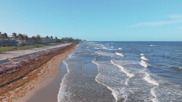 aerial drone view of Hillsboro Beach, Florida with city and ocean