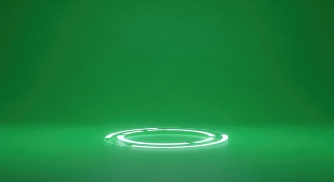A glowing white ring shines brightly on a green background with a spotlight effect.