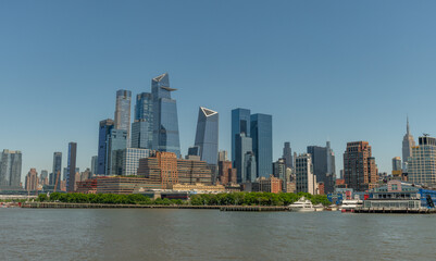 Scenic panoramic Hudson Yards and Chelsea vista from Hudson river in the summer, Manhattan, New York City