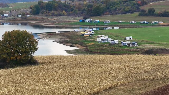 Authentic Lakeside Camping and Fishing Scene with Rural Charm