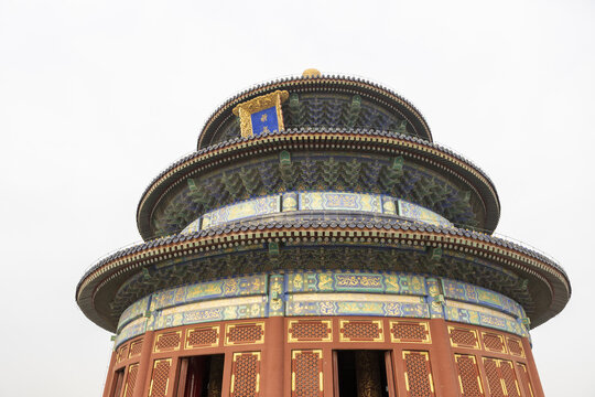 View of the Hall of Prayer for Good Harvests at the Temple of Heaven with its iconic triple-eaved circular roof and ornate colorful details in Beijing, Beijing, China.