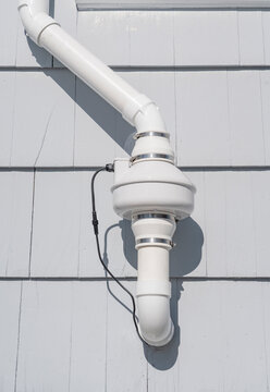 radon mitigation installed system outside the house
