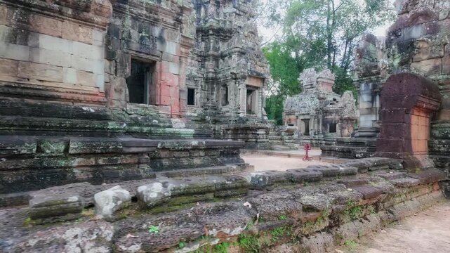 Ancient stone ruins of Thommanon Temple, Siem Reap, Cambodia. The intricate carvings and weathered stone showcase the historical significance of this Khmer Empire architectural marvel.
