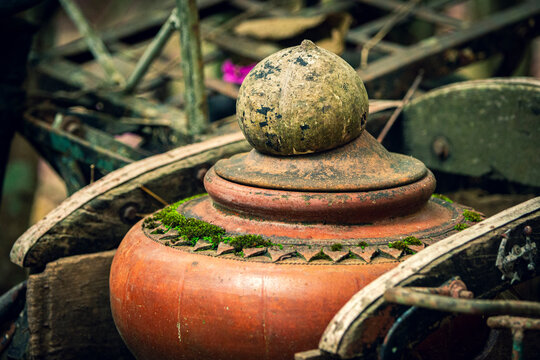 Old clay pot in the garden,vintage style,selective focus