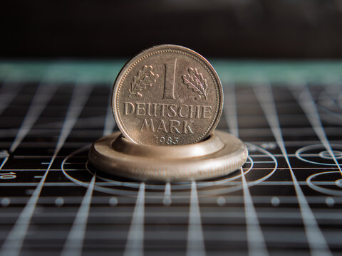 One Deutsche Mark Coin on Black Background
