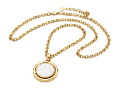Delicate gold chain necklace with a round pendant and a white gemstone