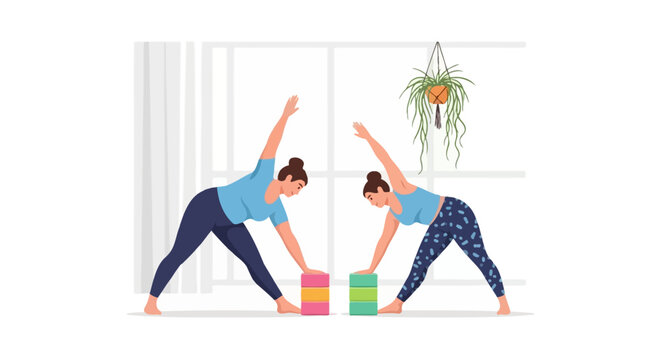 Women practicing triangle pose with yoga blocks indoors.